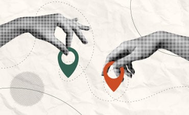 2 hands with map markers